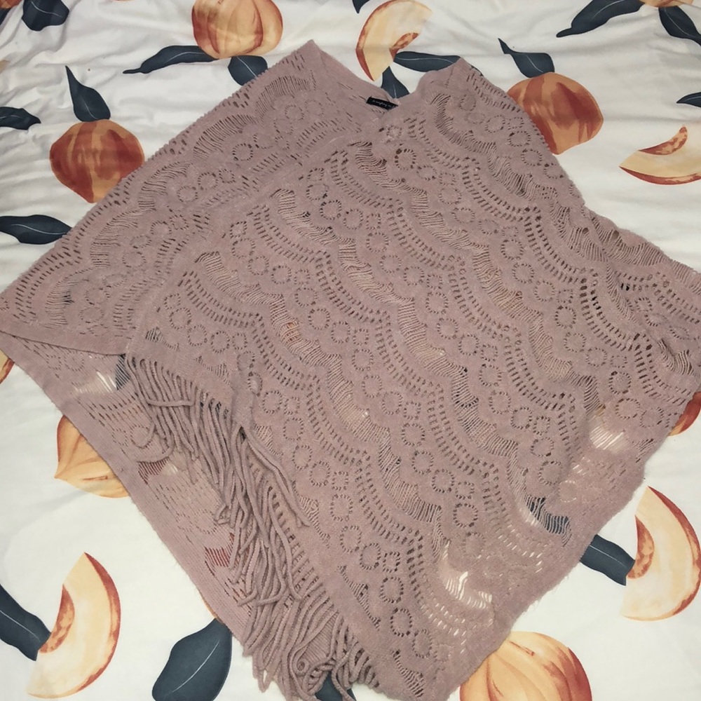 Knitted sleeveless poncho